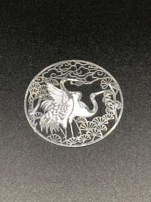 La plaque métallique ronde